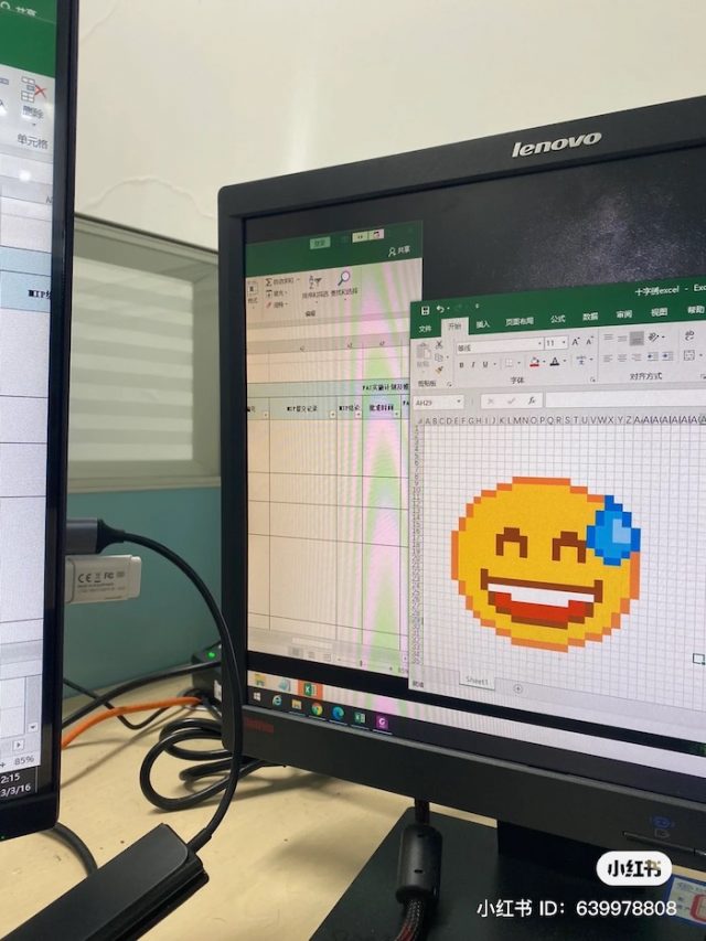 cross stitch with spreadsheets at work